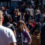 pedestrians on street in city